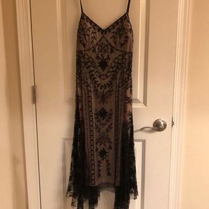 Beautiful beaded lace overlay dress. NWT